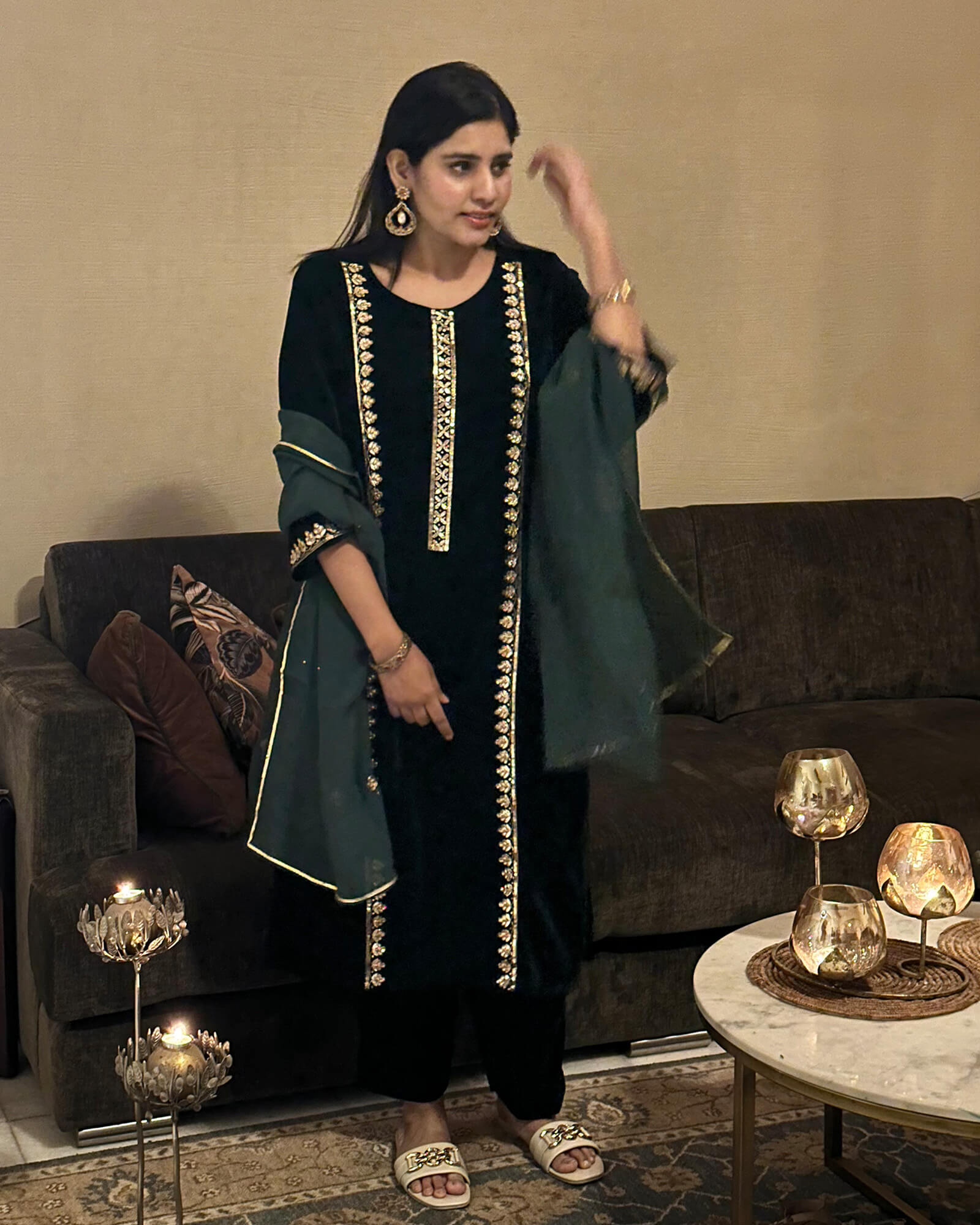 Velvet suit set adorned with zari and appliqué work and paired with organza  Dupatta